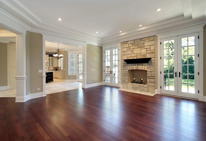 stunning acacia hardwood floors in a luxurious master bedroom